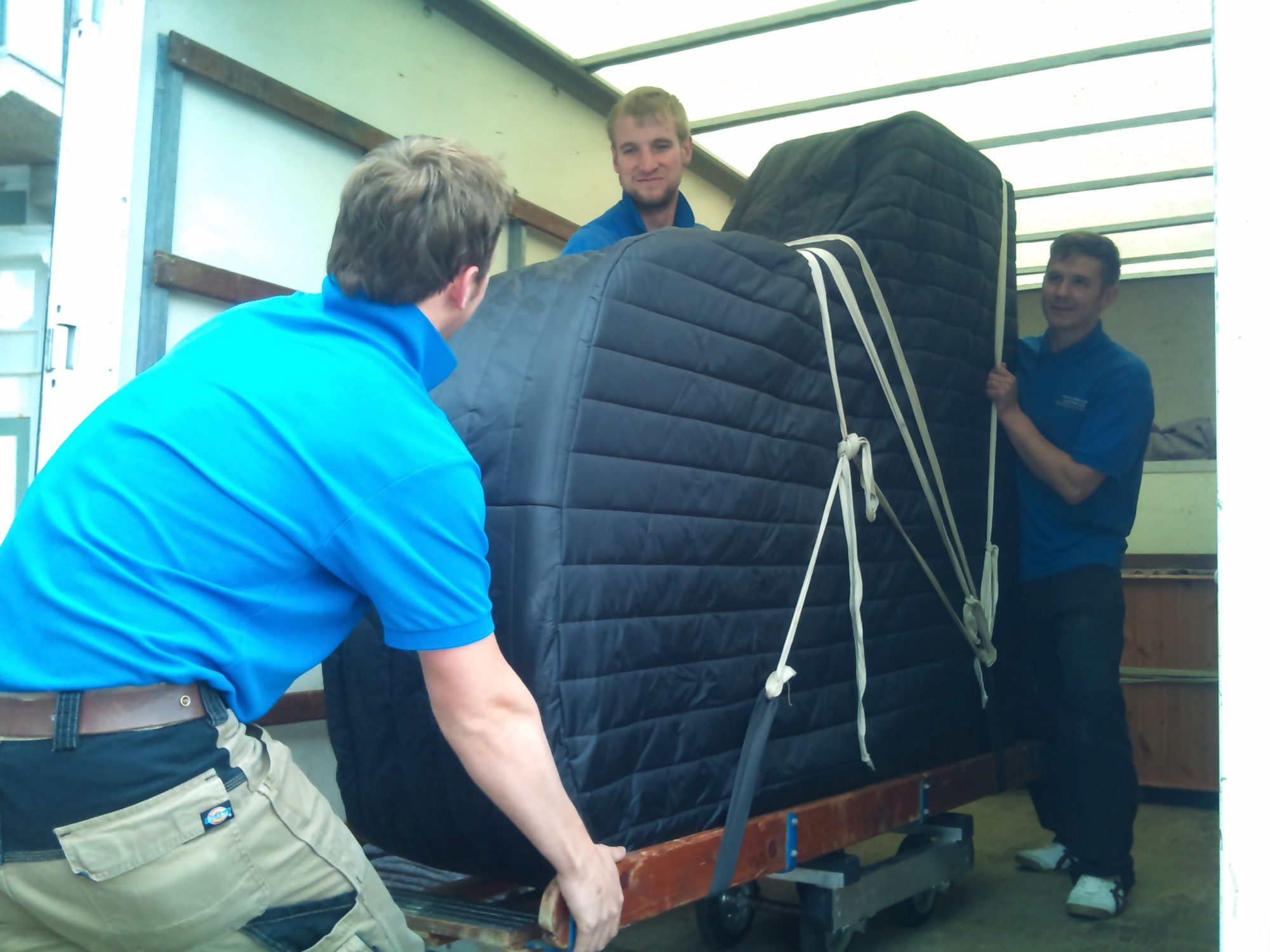 Professional moving team packing items